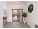 Bright living space with sliding glass doors to the backyard and modern flooring at 1410 S Boulder St # A, Gilbert, AZ 85296
