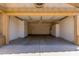 Spacious garage with built-in storage cabinets, providing ample space for vehicles and organization at 14561 W Winding Trl, Surprise, AZ 85374