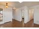 Bright entryway with tile flooring, white door, and views into other rooms at 14922 N 172Nd Dr, Surprise, AZ 85388