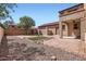 The backyard features brick pavers and desert landscaping, providing a low-maintenance outdoor space at 1710 S Parkcrest St, Gilbert, AZ 85295