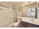 Bathroom featuring a shower-tub combo and vanity with sink at 1710 S Parkcrest St, Gilbert, AZ 85295