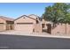 The exterior features a well-maintained facade and attached garage, offering curb appeal at 1710 S Parkcrest St, Gilbert, AZ 85295