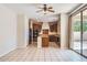 A spacious kitchen featuring a center island and seamless access to the backyard and dining room at 1710 S Parkcrest St, Gilbert, AZ 85295