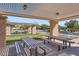 Community picnic area with multiple picnic tables under covered pergolas at 1710 S Parkcrest St, Gilbert, AZ 85295