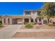 Charming home with a spacious covered carport, desert landscaping and beautiful curb appeal at 17853 W Pershing St, Surprise, AZ 85388
