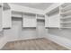 Walk-in closet features shelving and rods for ample storage space at 17853 W Pershing St, Surprise, AZ 85388