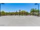 Outdoor basketball court with a hoop, offering a great space for recreational sports and activities at 1854 W Fetlock Trl, Phoenix, AZ 85085