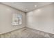 Neutral bedroom featuring plush carpeting, fresh paint, and ample natural light at 1854 W Fetlock Trl, Phoenix, AZ 85085