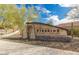 Stone monument sign for Fireside at Norterra by Del Webb with desert landscaping and blue sky at 1854 W Fetlock Trl, Phoenix, AZ 85085