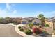 An aerial view of the exterior showing desert landscaping and nearby homes in the neighborhood at 20082 N 272Nd Ln, Buckeye, AZ 85396