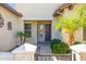 A beautiful front entrance with charming desert landscaping adding to the welcoming curb appeal at 20082 N 272Nd Ln, Buckeye, AZ 85396