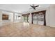 A large, open living area with tile flooring and plenty of natural light at 20082 N 272Nd Ln, Buckeye, AZ 85396