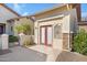 A lovely side entrance featuring double doors and attractive landscaping with desert plants at 20082 N 272Nd Ln, Buckeye, AZ 85396