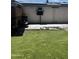 A backyard with artificial grass and solar panels on the roof at 2011 N 26Th Cir, Mesa, AZ 85213