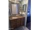 Bathroom with a single sink and decorative touches at 2011 N 26Th Cir, Mesa, AZ 85213