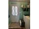 Laundry room with door to the exterior and shelving at 2011 N 26Th Cir, Mesa, AZ 85213