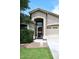 Welcoming front entrance with security door, decorative window, and tidy landscaping at 2727 S 160 Ln, Goodyear, AZ 85338