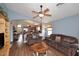 Spacious living room with wood flooring and plenty of natural light at 2727 S 160 Ln, Goodyear, AZ 85338