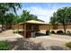 Community pavilion with picnic tables offers a shaded retreat for gatherings and relaxation at 2727 S 160 Ln, Goodyear, AZ 85338