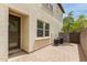 Paver patio with two AC units outside the back of the home at 2854 N Claire Dr, Buckeye, AZ 85396
