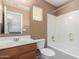 Bathroom featuring a tub and shower combination and a vanity with sink at 2854 N Claire Dr, Buckeye, AZ 85396