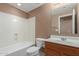 Bathroom featuring a tub and shower combination and a vanity with sink at 2854 N Claire Dr, Buckeye, AZ 85396