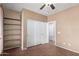 Bright bedroom with wood floors and a closet, providing a cozy atmosphere at 2854 N Claire Dr, Buckeye, AZ 85396