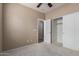 Neutral bedroom with carpet, and closet with sliding doors at 2854 N Claire Dr, Buckeye, AZ 85396