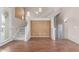 Bright living room with high ceilings, staircase, and natural light at 2854 N Claire Dr, Buckeye, AZ 85396