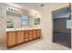 Bathroom with double sinks, tiled flooring, large mirror and neutral tones at 2862 E Megan St, Gilbert, AZ 85295