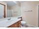 Bathroom featuring a large mirror, tiled floors, and a shower and bath combination at 2862 E Megan St, Gilbert, AZ 85295