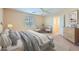 Comfortable bedroom with a bed, a ceiling fan, and lots of natural light at 2862 E Megan St, Gilbert, AZ 85295