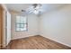 Bright bedroom with hardwood flooring, a ceiling fan, and lots of natural light at 2862 E Megan St, Gilbert, AZ 85295