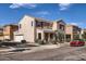 Inviting two-story home with desert landscaping, two-car garage, and classic tile roof at 2862 E Megan St, Gilbert, AZ 85295
