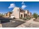 Charming two-story home featuring desert landscaping, a two-car garage, and a tiled roof at 2862 E Megan St, Gilbert, AZ 85295