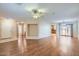 Open living room with wood flooring, bright natural light, and an open floor plan at 2862 E Megan St, Gilbert, AZ 85295