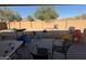 Spacious backyard featuring a block wall and a covered patio at 2981 S 257Th Ave, Buckeye, AZ 85326