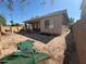 Backyard and covered patio with an outdoor living space at 2981 S 257Th Ave, Buckeye, AZ 85326