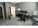 Bedroom featuring carpeted flooring, and a closet with double doors at 2981 S 257Th Ave, Buckeye, AZ 85326