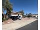 Charming single-story home with desert landscaping, a driveway, and a two-car garage at 2981 S 257Th Ave, Buckeye, AZ 85326