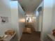 Light and airy hallway with arched doorways leading to the living areas at 2981 S 257Th Ave, Buckeye, AZ 85326