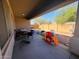Covered patio area perfect for outdoor dining and entertaining with backyard views at 2981 S 257Th Ave, Buckeye, AZ 85326