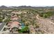 Aerial view of neighborhood with lush desert landscaping and community features at 31221 N 130Th Ln, Peoria, AZ 85383