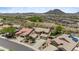 Aerial view of home with lush desert landscaping, mature trees, and mountain views at 31221 N 130Th Ln, Peoria, AZ 85383