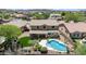 Aerial view of a two-story home with a pool and landscaped backyard at 31221 N 130Th Ln, Peoria, AZ 85383