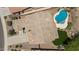 Aerial shot of the roof, pool, backyard, and driveway of home at 31221 N 130Th Ln, Peoria, AZ 85383