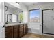 Primary bath features double sinks, a bathtub, and separate shower at 31221 N 130Th Ln, Peoria, AZ 85383