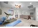Upstairs bonus room featuring a ceiling fan and carpet flooring at 31221 N 130Th Ln, Peoria, AZ 85383