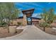 Inviting community clubhouse with modern architecture and desert landscaping at 31221 N 130Th Ln, Peoria, AZ 85383