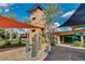 Attractive community center featuring unique architectural design, desert landscaping, and inviting common areas at 31221 N 130Th Ln, Peoria, AZ 85383